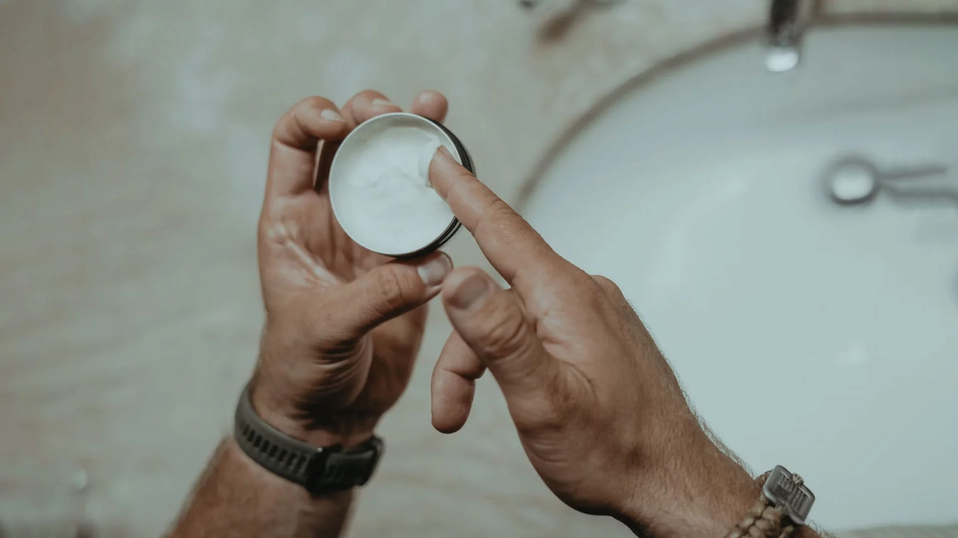 A man is holding Ark brand
