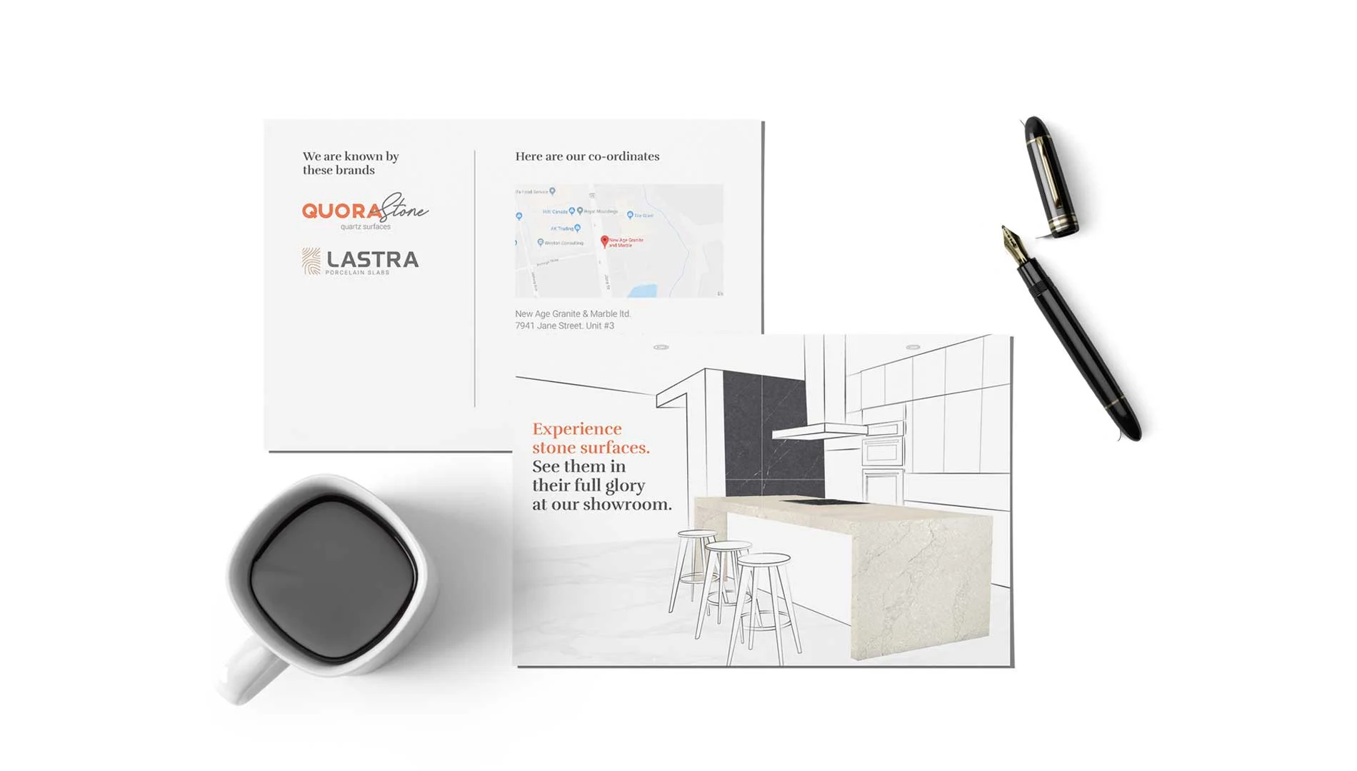 A coffee cup sits beside a brochure, with a pen resting on top, creating a cozy workspace atmosphere